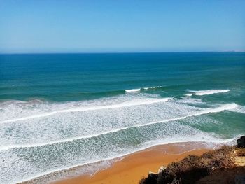 Scenic view of sea against clear sky