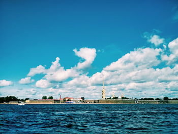 Scenic view of sea against blue sky