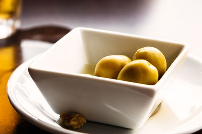 Close-up of fruits in plate on table