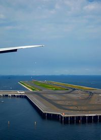 Airplane flying over sea