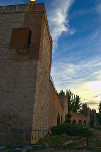 Low angle view of old building against sky