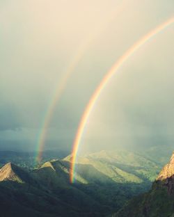 Rainbow over mountains