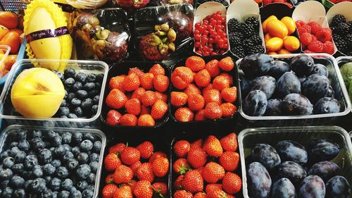 Various fruits for sale at market stall