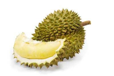 Close-up of fruit against white background