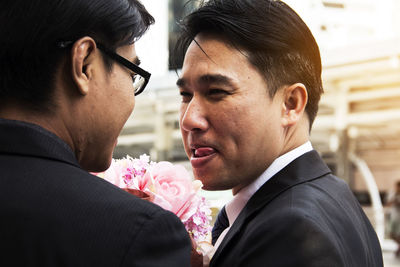 Close-up of couple kissing outdoors