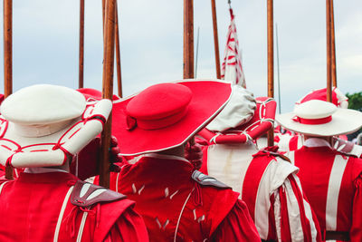 Rear view of men standing in parade