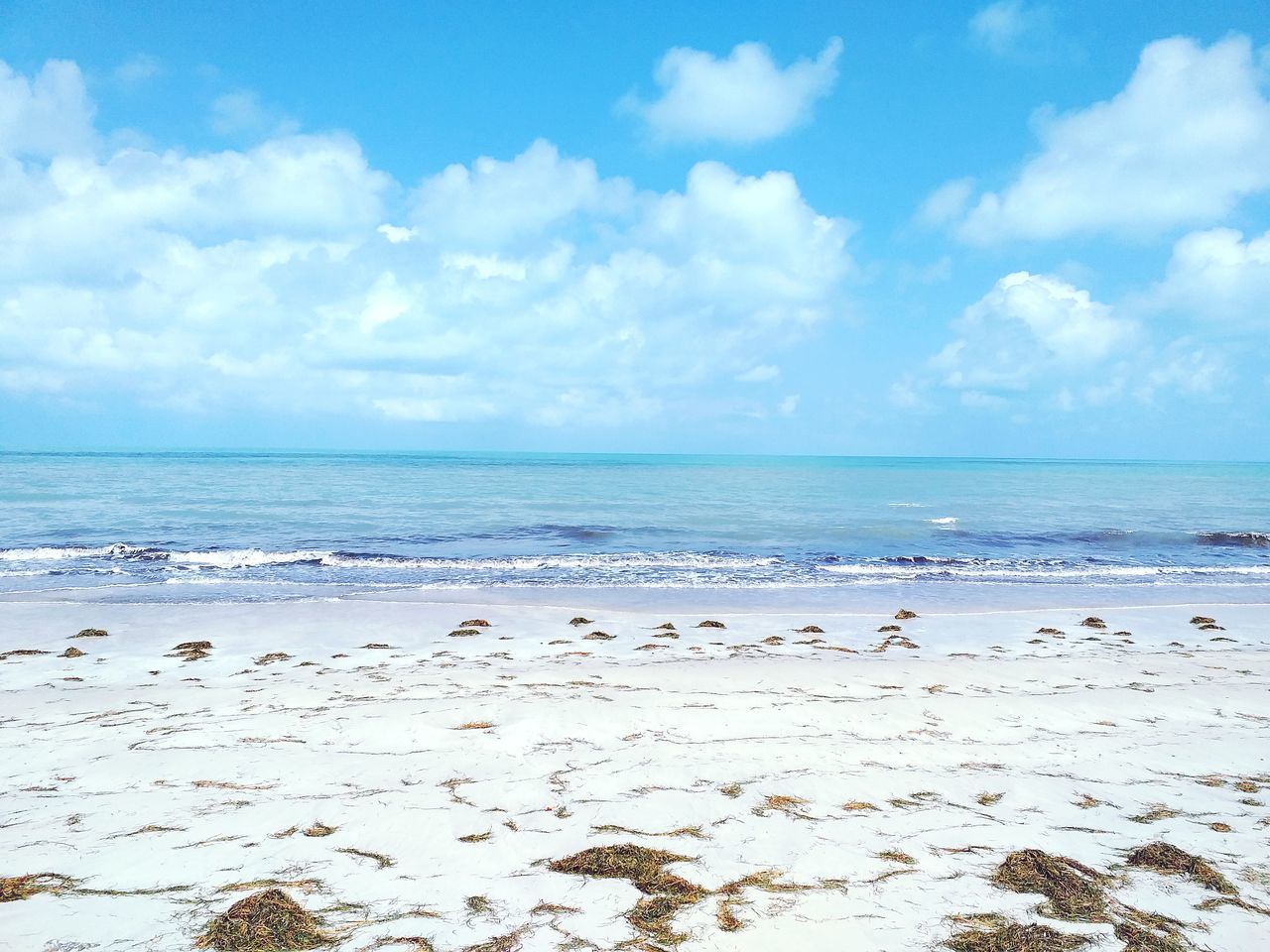 sea, beach, land, sky, water, scenics - nature, beauty in nature, horizon over water, tranquil scene, cloud - sky, tranquility, horizon, sand, nature, idyllic, no people, day, blue, non-urban scene, outdoors, turquoise colored