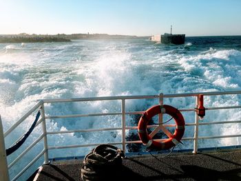 Nautical vessel on sea against sky