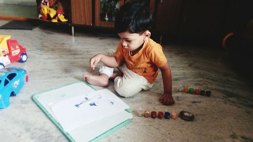 Boy playing at home