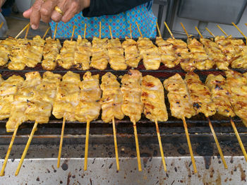 High angle view of meat on barbecue grill