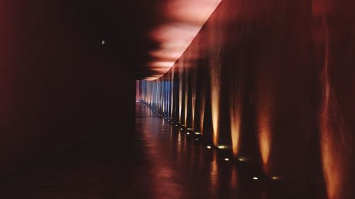 Illuminated corridor of building