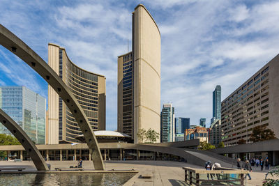 Low angle view of modern buildings against sky