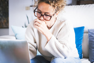 Young woman using mobile phone