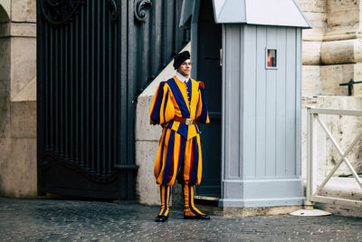 Full length portrait of man standing outdoors