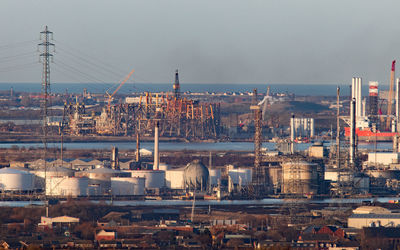 High angle view of buildings in city against sky