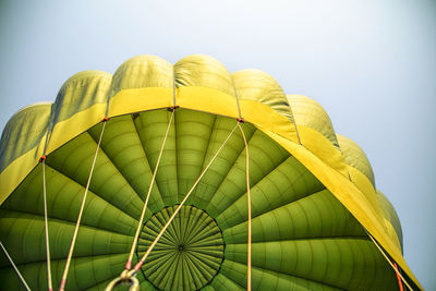 Low angle view of hot air balloon against clear sky