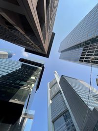 Low angle view of skyscrapers against sky