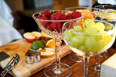 Close-up of fruits in plate on table