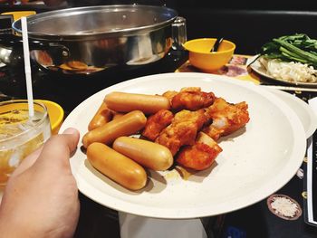 Close-up of hand holding food