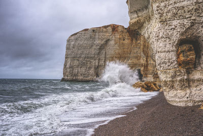 Scenic view of sea shore against sky