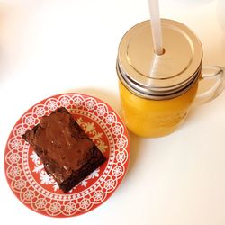 High angle view of breakfast on table against white background