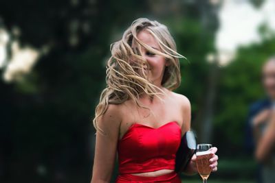 Young woman standing outdoors