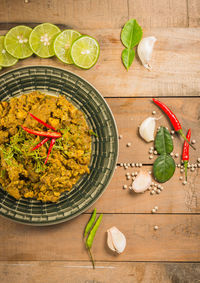 Directly above shot of green chili peppers on table