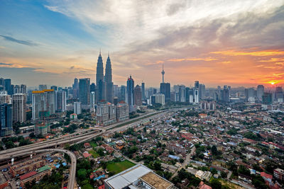 High angle shot of cityscape against the sky