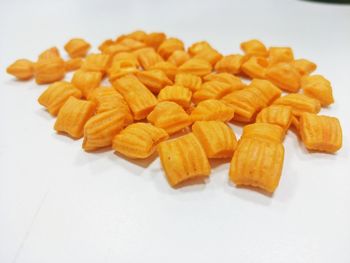 High angle view of chopped vegetables against white background