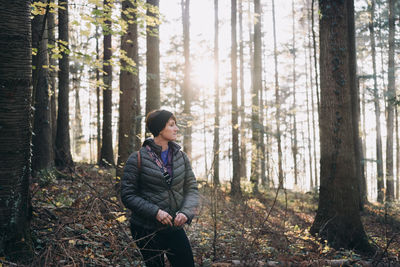 Portrait  of young woman in forest