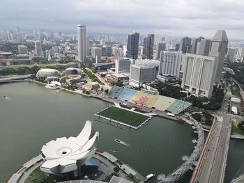 High angle view of river amidst buildings in city