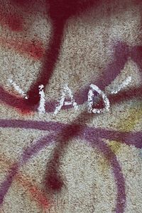 High angle view of graffiti on carpet