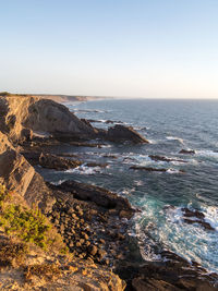 Scenic view of sea against clear sky