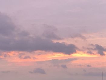 Low angle view of clouds in sky during sunset