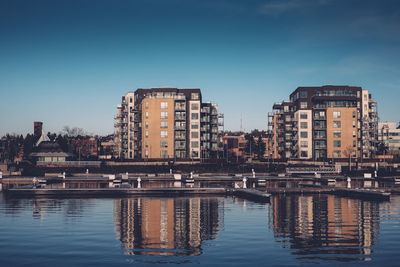 Reflection of buildings in river