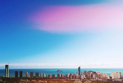 Scenic view of sea against blue sky