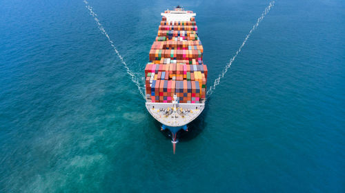 High angle view of boat sailing in sea