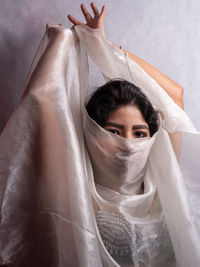 Beatiful lady dancing with veil