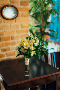 Flower vase on table