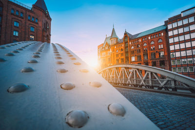 View of buildings in city against sky