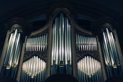 Low angle view of pipe organ at church