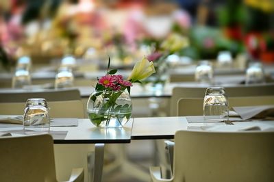 Empty chairs and tables in restaurant terrace