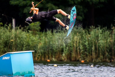 Man jumping in water