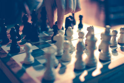 Close-up of chess pieces on table