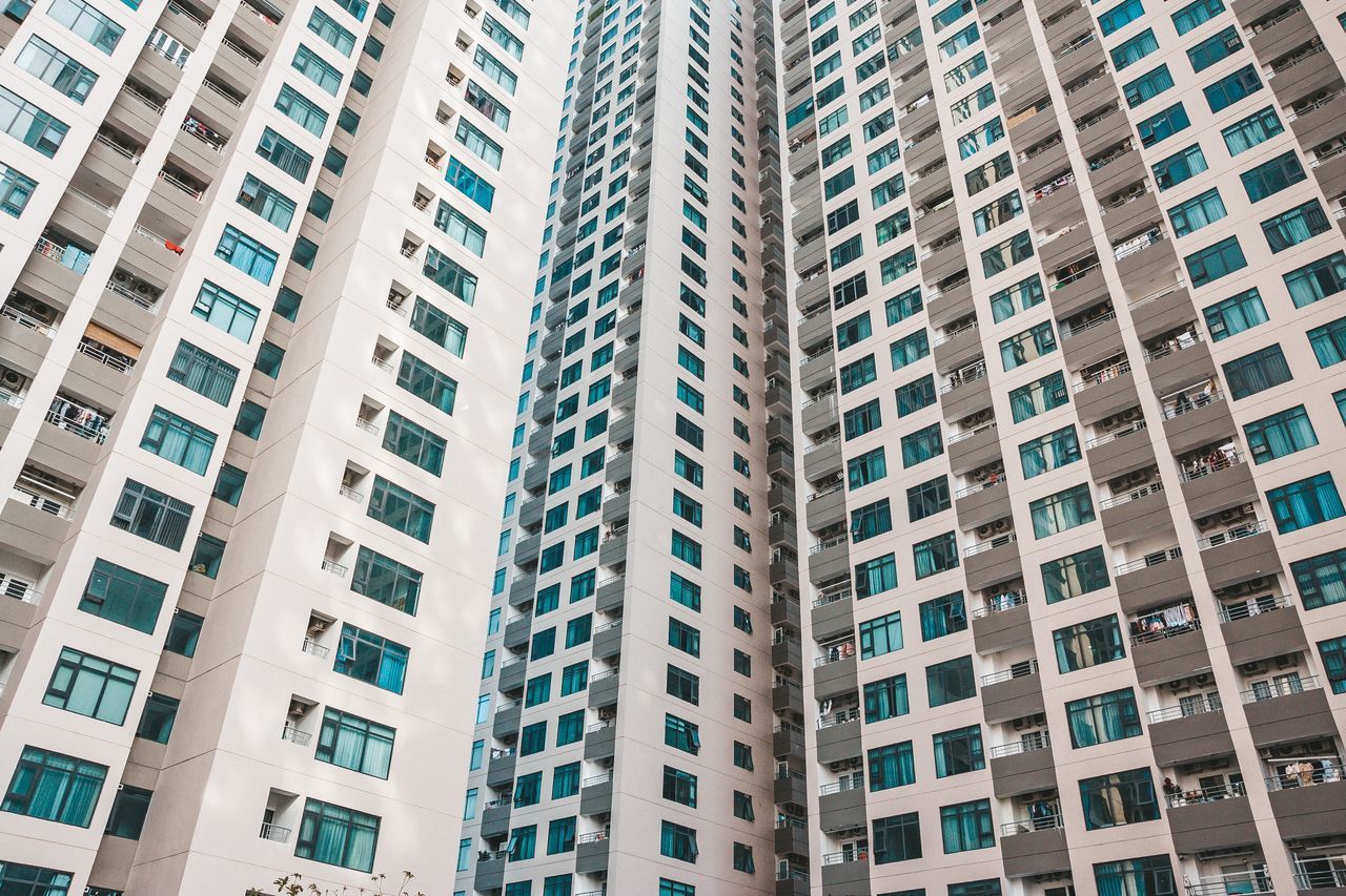 LOW ANGLE VIEW OF MODERN BUILDINGS