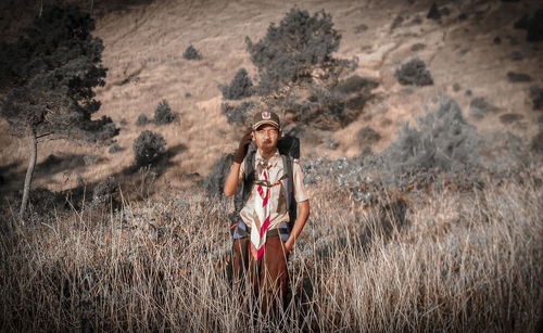 Full length of young woman standing on land