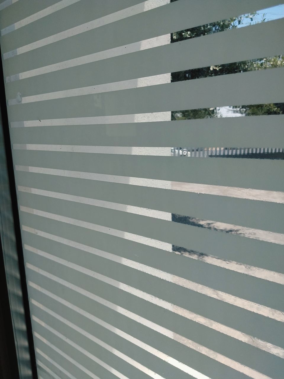 CLOSE-UP OF WINDOW BLINDS