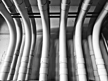 Low angle view of pipes in black and white 