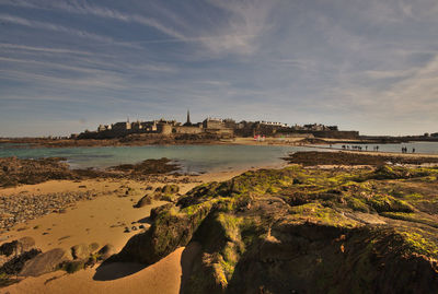 Scenic view of beach against sky