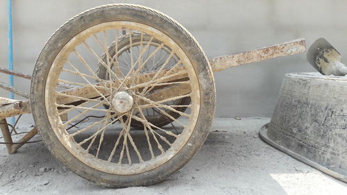 Close-up of old abandoned wheel